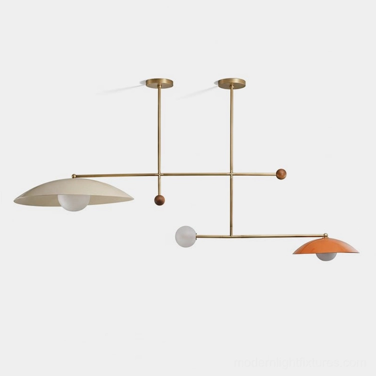 Modern linear brass chandelier with domed shades and wooden sphere accents, front view on white studio background
