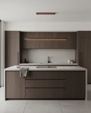 Modern walnut linear pendant light installed above dark kitchen island with warm 3000K ambient lighting creating elegant atmosphere