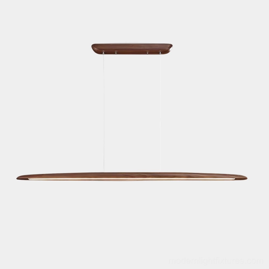 Modern linear LED wood chandelier with walnut finish suspended above dining space - minimalist pendant light design