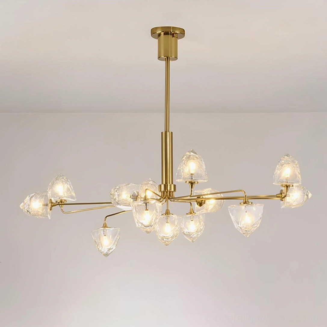 Modern luxury chandelier with faceted clear glass and metal suspension in upscale interior design