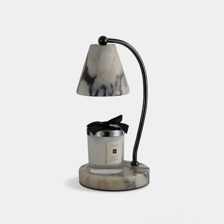Modern marble candle warmer lamp with curved black metal arm, front view on white background