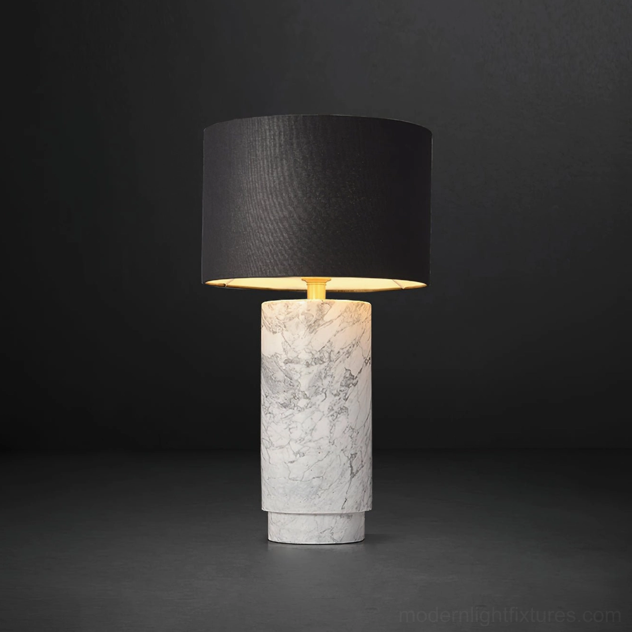 Modern marble table lamp featuring hand-selected natural stone base with fabric shade in studio photography