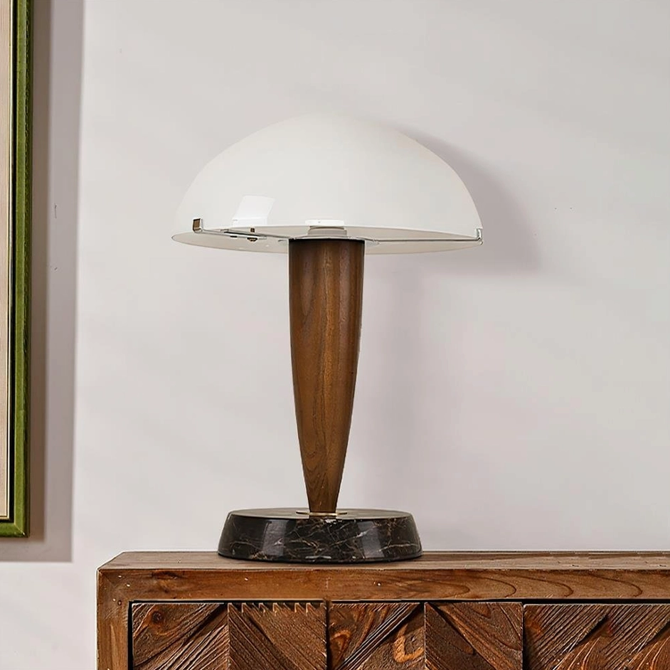 Tibby contemporary marble table lamp displayed on carved wooden dresser with neutral wall background - modern home décor styling