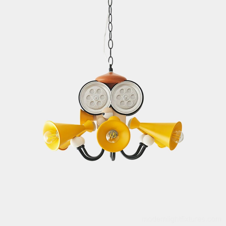 Octopus Director Chandelier front view with oversized yellow reel-inspired eye panels and black metal arms, studio photography
