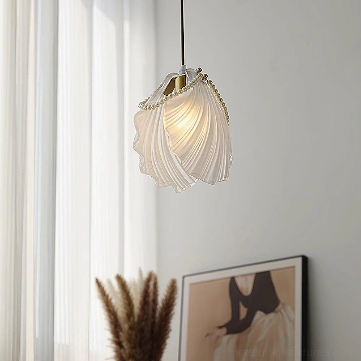 Modern pearl shell pendant light fixture showcasing ruffled frosted glass shade artistry