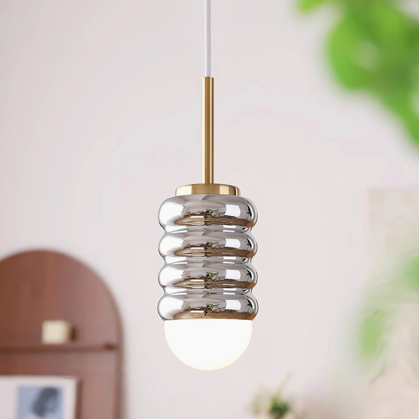 Modern pendant fixture with adjustable cord length, sloped ceiling compatible lighting solution