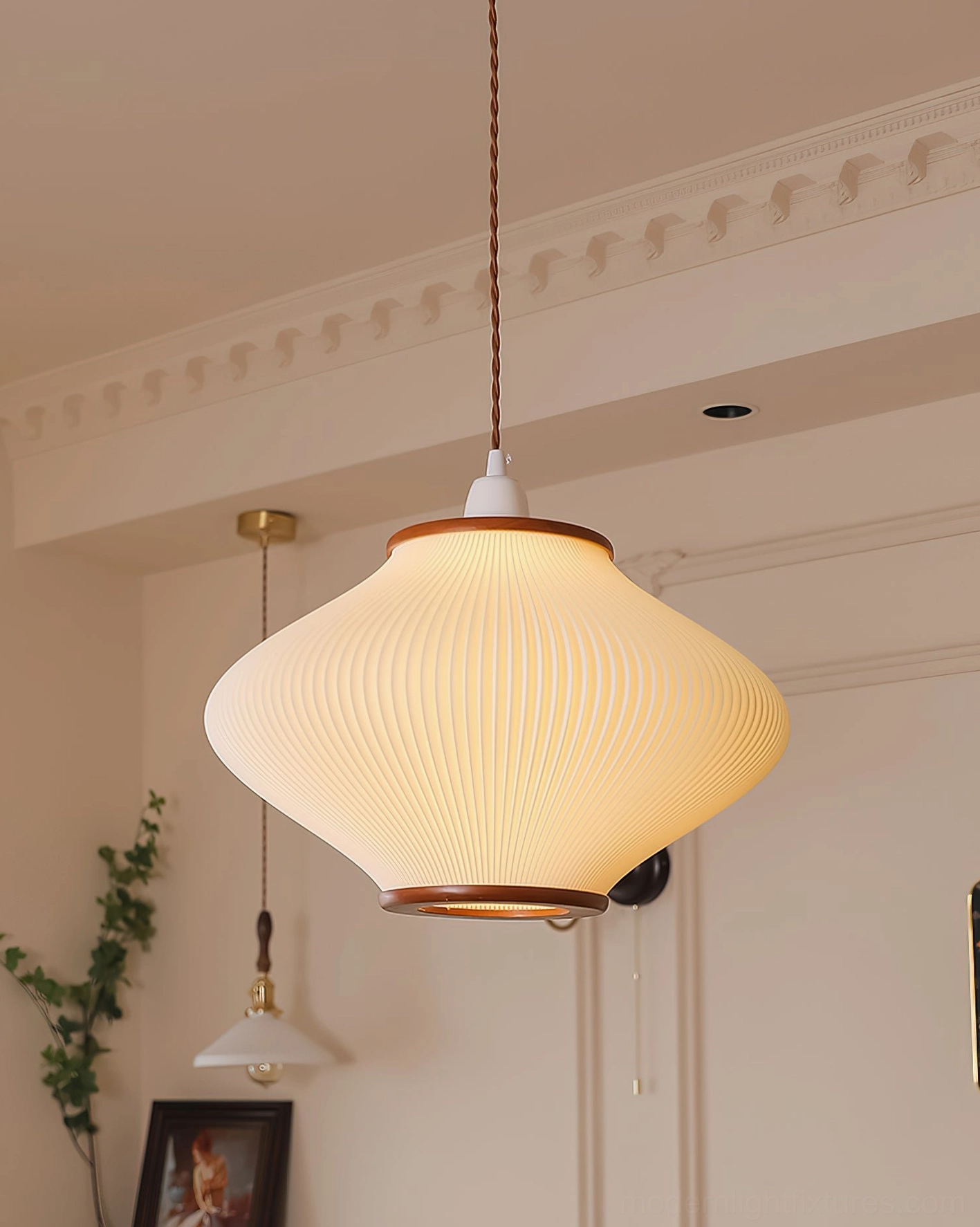 Contemporary ribbed acrylic pendant fixture with wood trim in classic residential interior, angled perspective