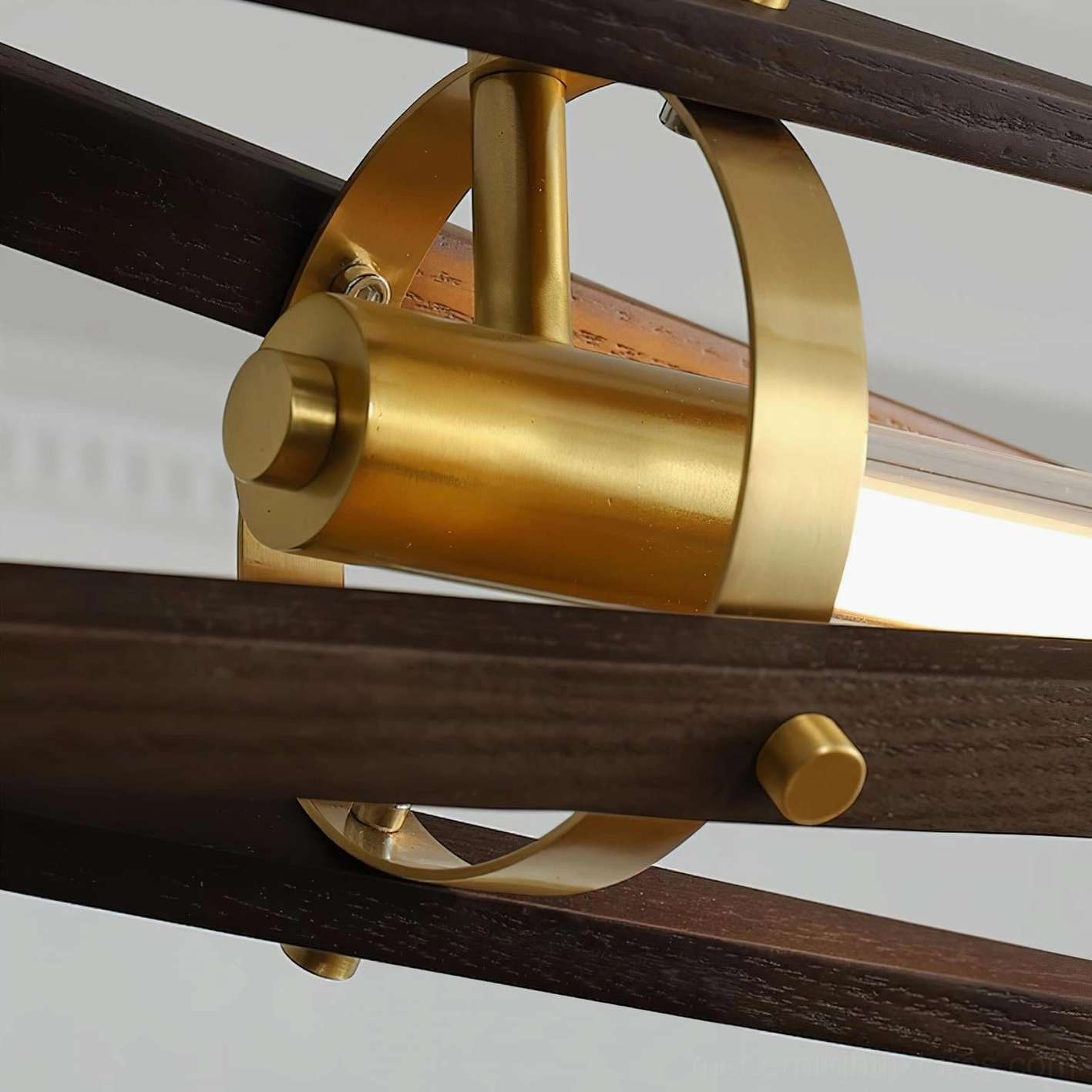 Modern pendant lamp with crossed wooden elements and integrated warm white illumination, architectural design