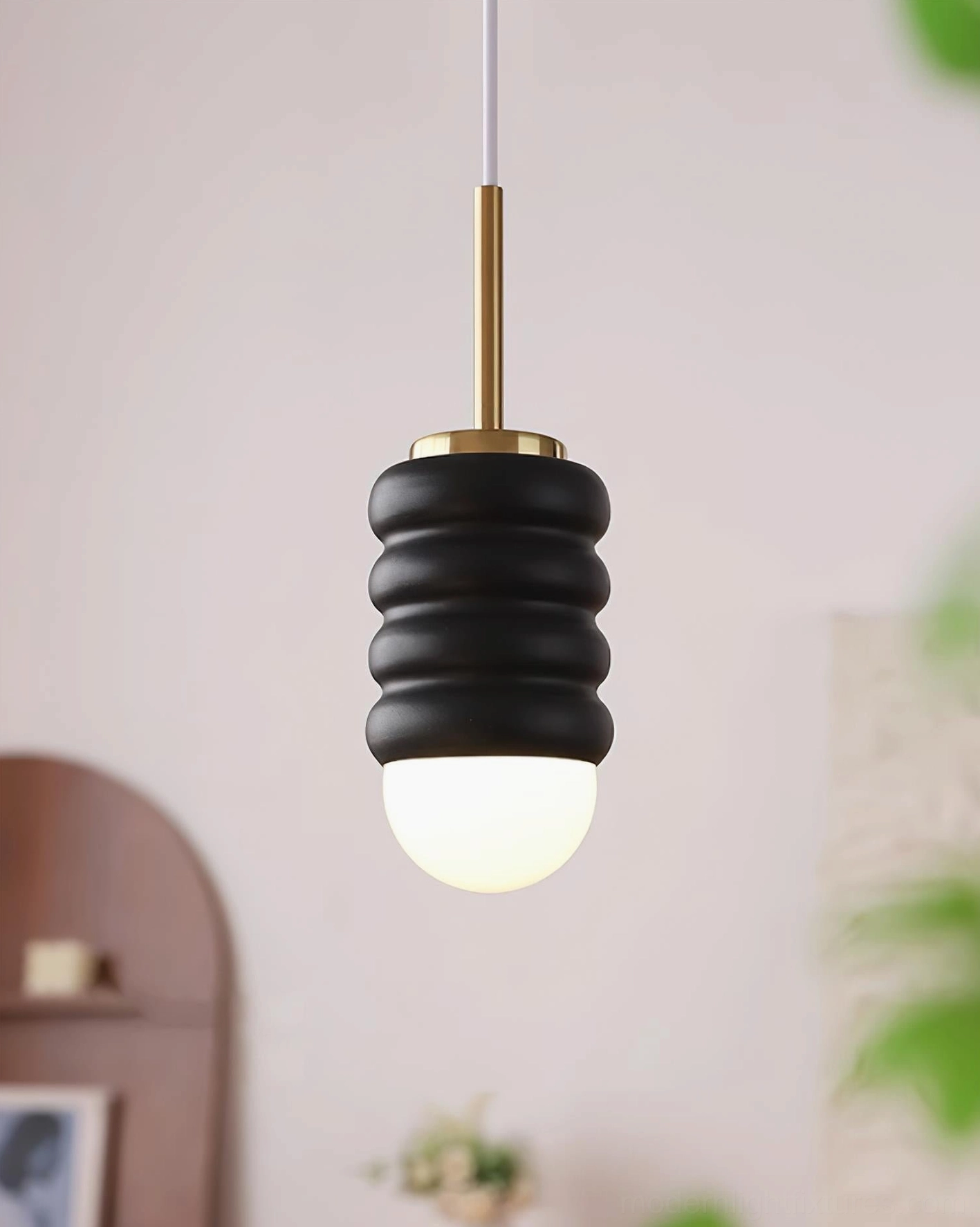 Modern minimalist pendant lamp in matte black, contemporary ceiling fixture for living room and bedroom