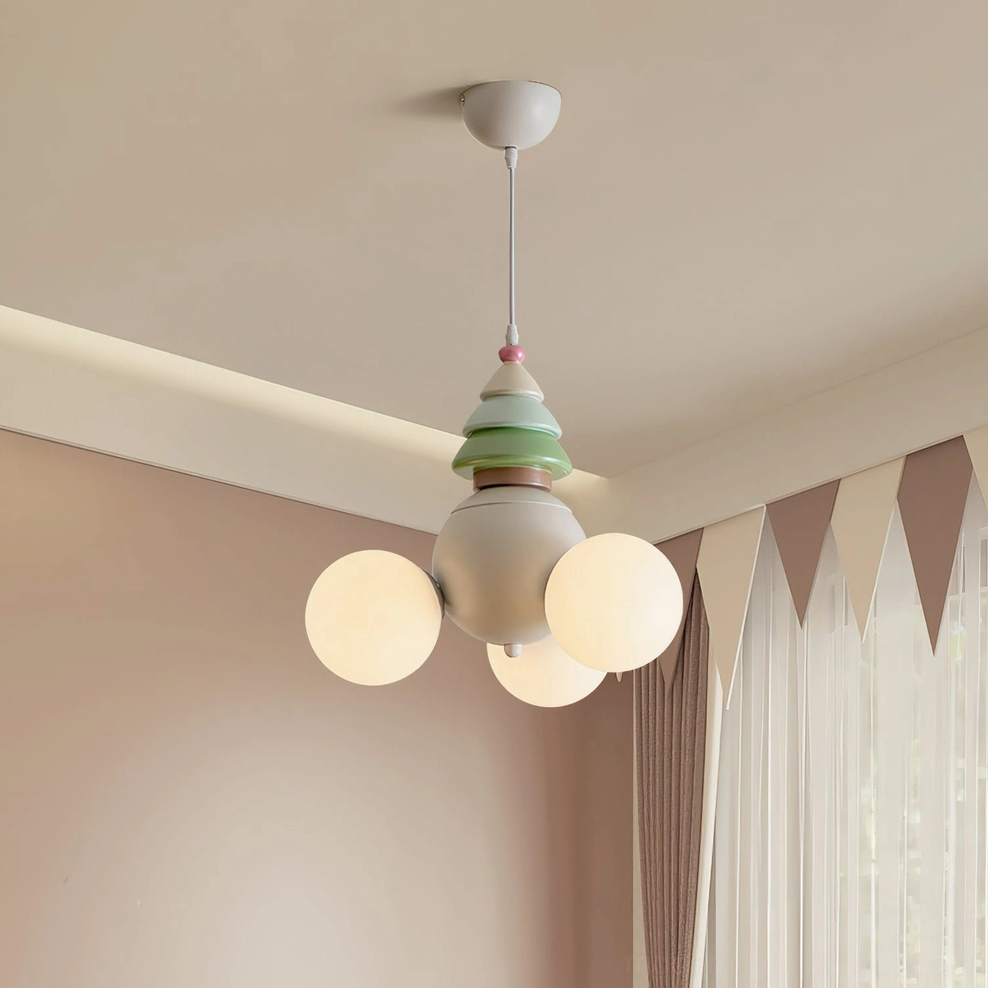 Contemporary multi-head pendant lamp installed in warm bedroom interior, overhead three-quarter angle