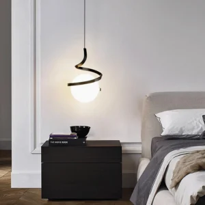 Contemporary wire pendant lamp installed in modern bedroom, side view showing sculptural metal spiral design