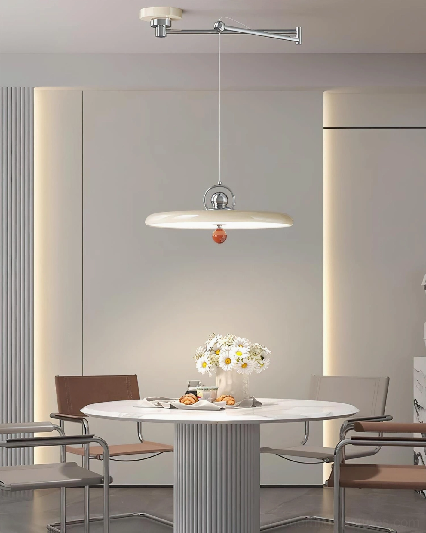 Beige swing arm pendant light installed in modern home dining room with neutral color scheme and polished chrome hardware