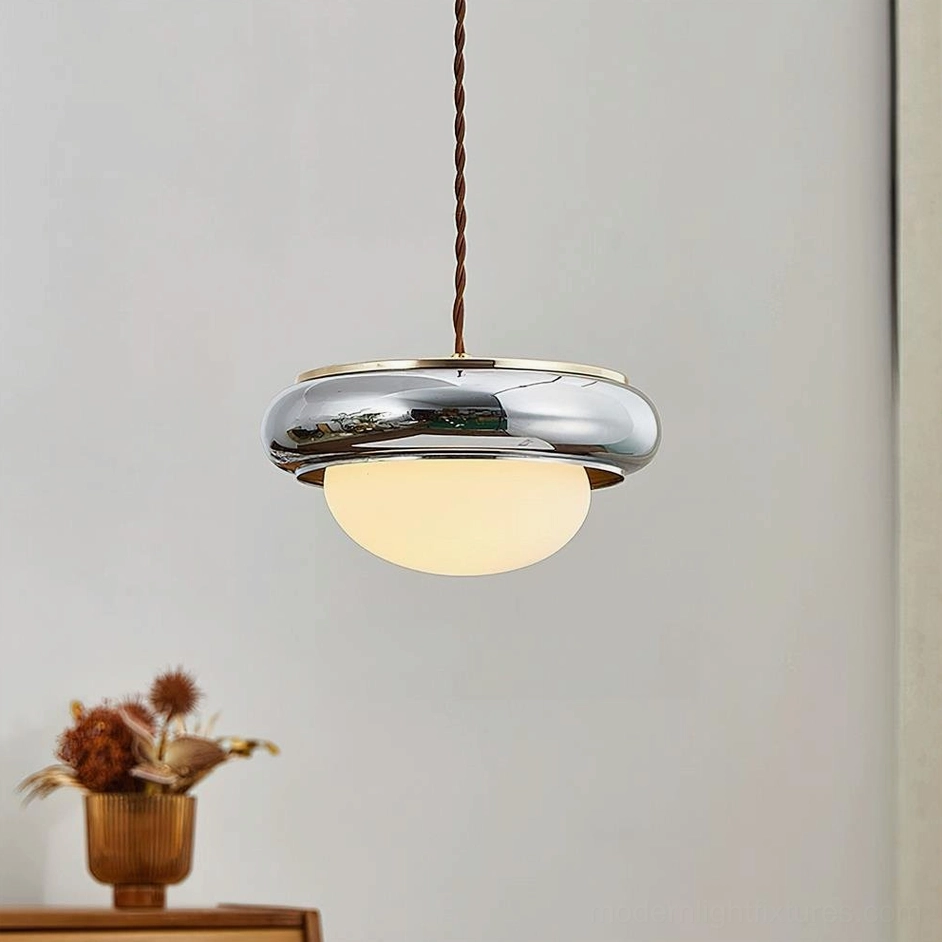 Modern pendant fixture with polished chrome metal ring and frosted white glass globe shade