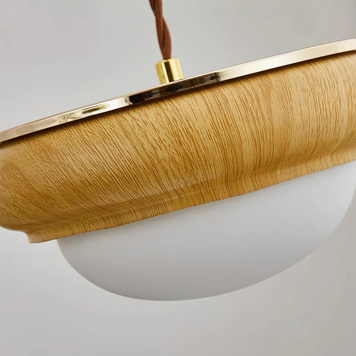 Contemporary wood and glass pendant light detail view natural material craftsmanship