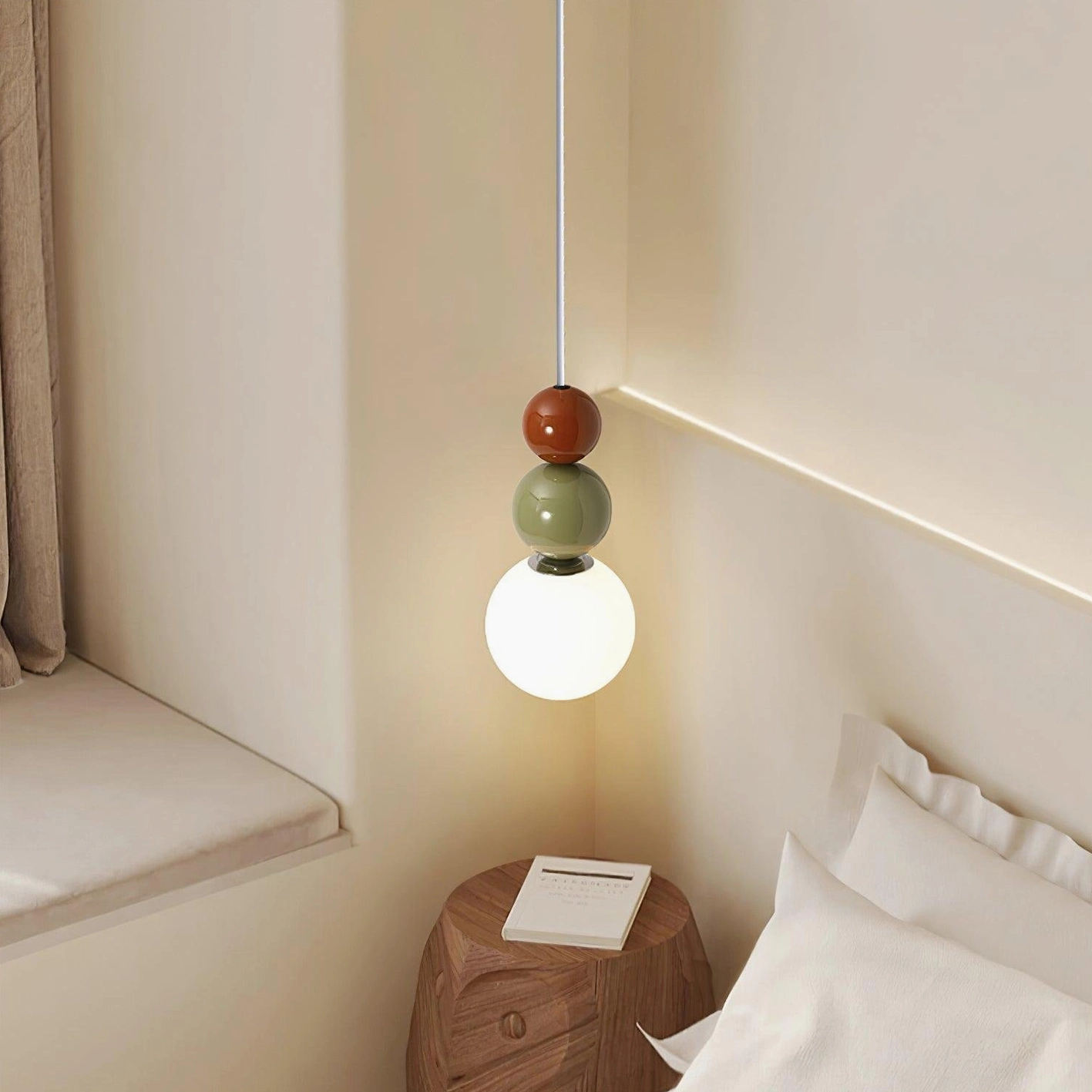 Modern pendant light installation example showing three-sphere fixture aesthetic