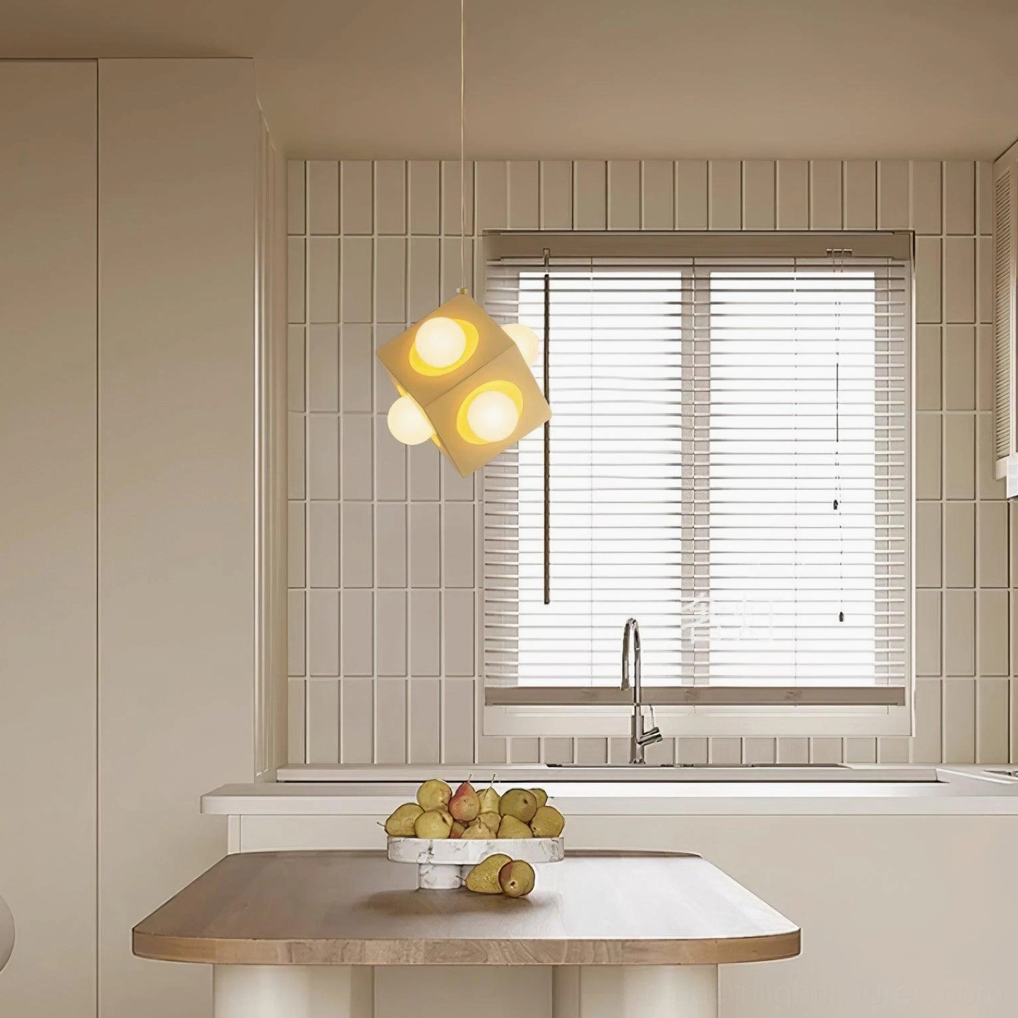 Contemporary pendant light illuminating kitchen dining area above wooden table with elegant warm glow