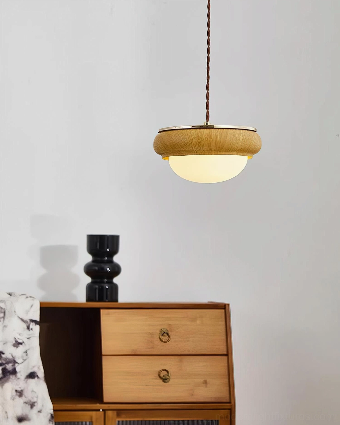 Light oak wood pendant lighting with frosted creamy glass globe studio white backdrop