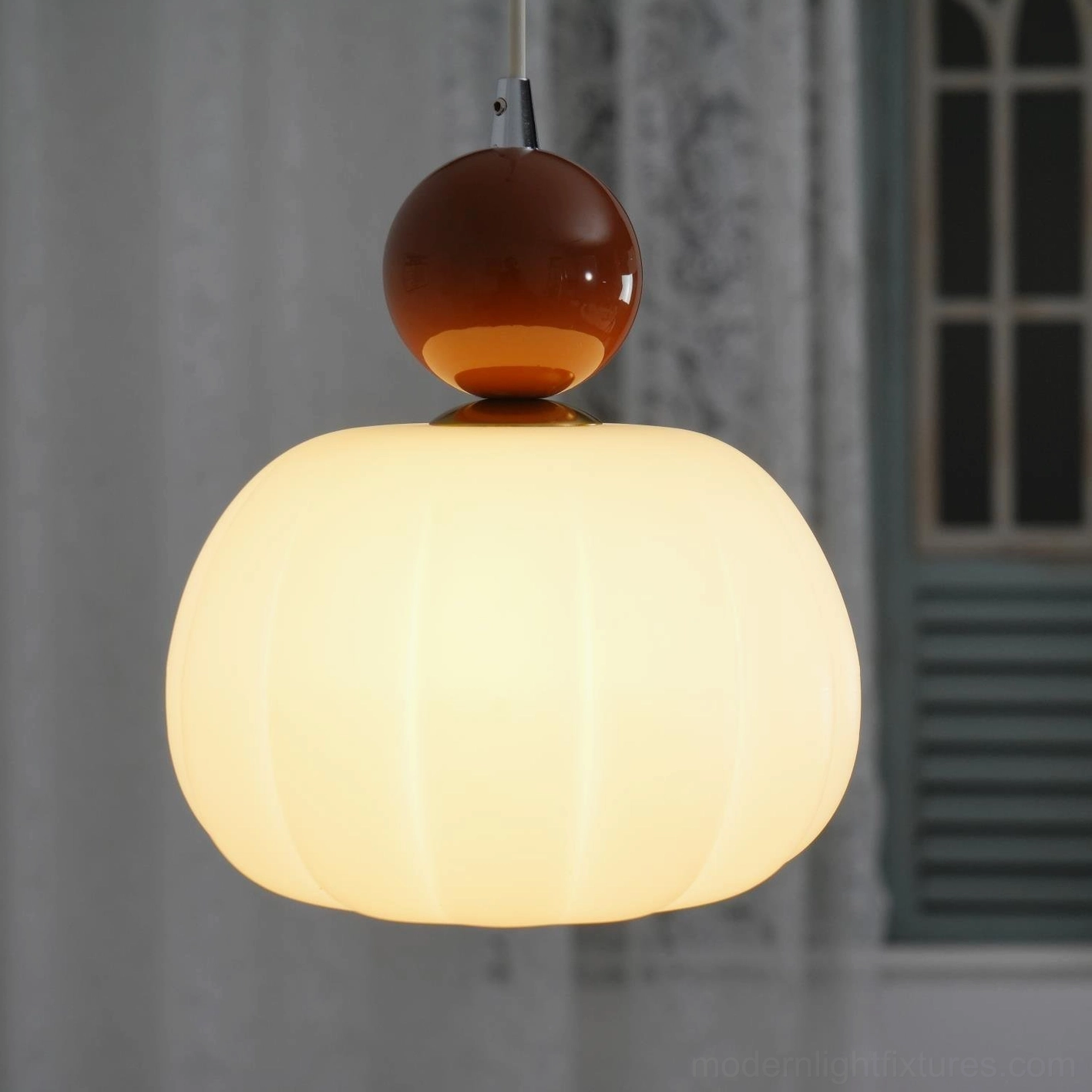 Morris ribbed acrylic pendant in warm interior lighting - ambient pendant fixture warm glow effect