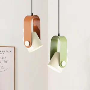Pair of contemporary pendant lights in beige and sage green color options, side-by-side comparison