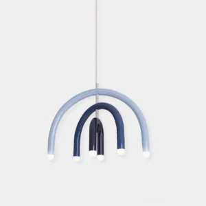 Modern rainbow arc pendant light with blue gradient curved design, minimalist studio view