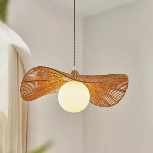 Modern rattan hanging lamp three-quarter view showing brown woven shade texture and warm ambient light