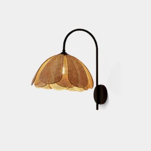 Rattan petal wall sconce with black metal frame on white studio background, front flat view showing natural woven shade