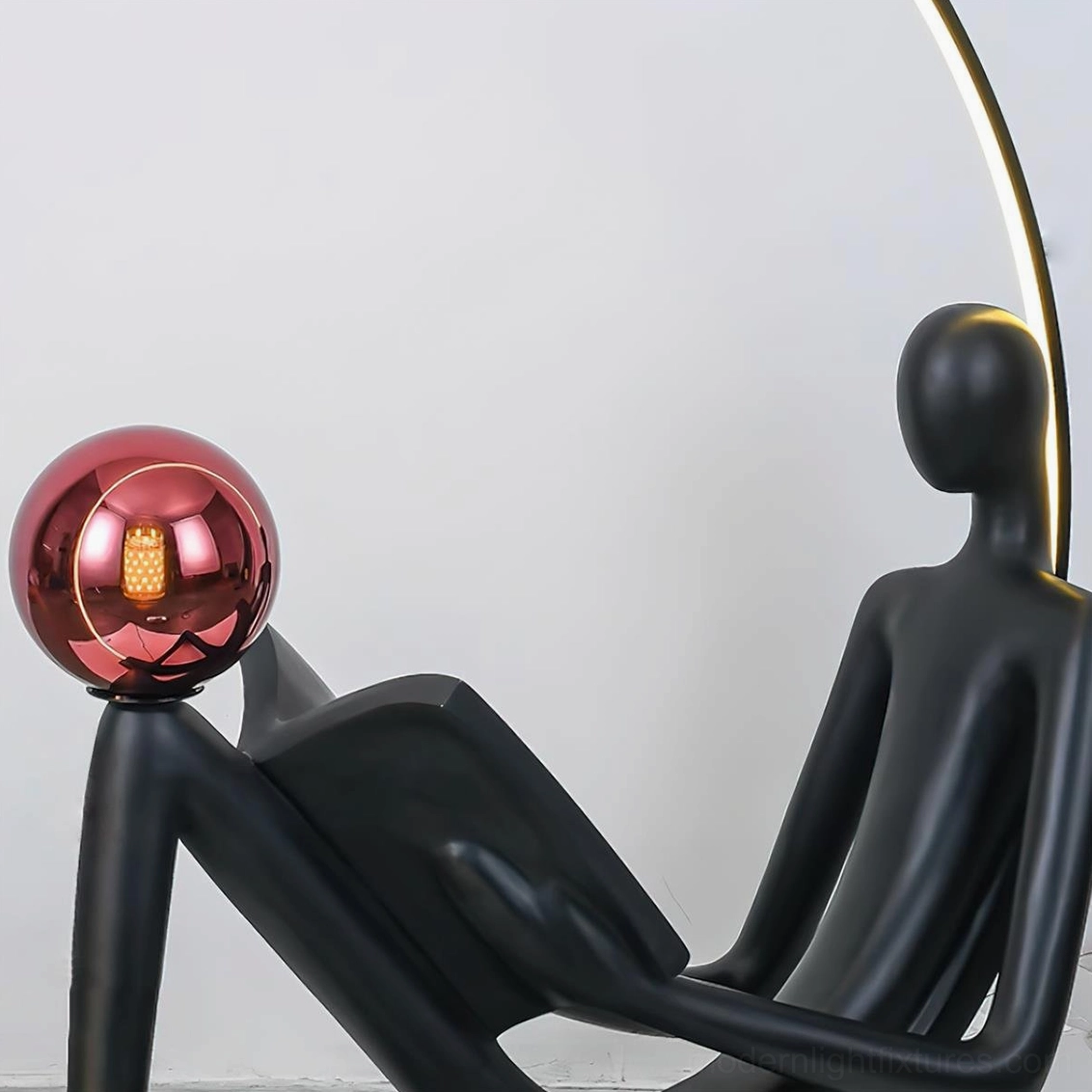Modern reading statue floor lamp with integrated LED, elegant black figure engrossed in intellectual pursuit