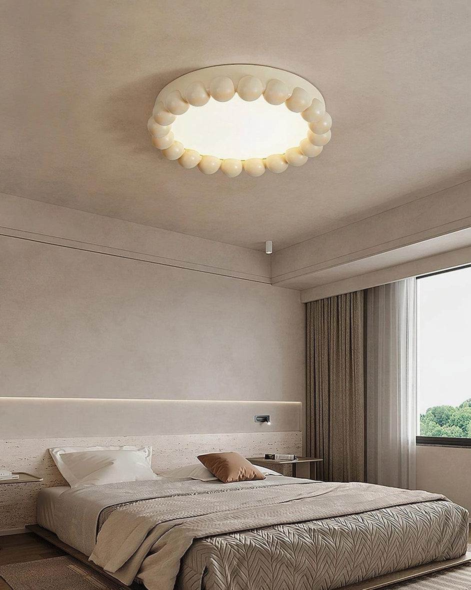 Modern recessed beaded ceiling light fixture with integrated LED in contemporary home setting
