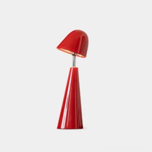 Glossy red cone-shaped modern table lamp with integrated LED, front view on white background