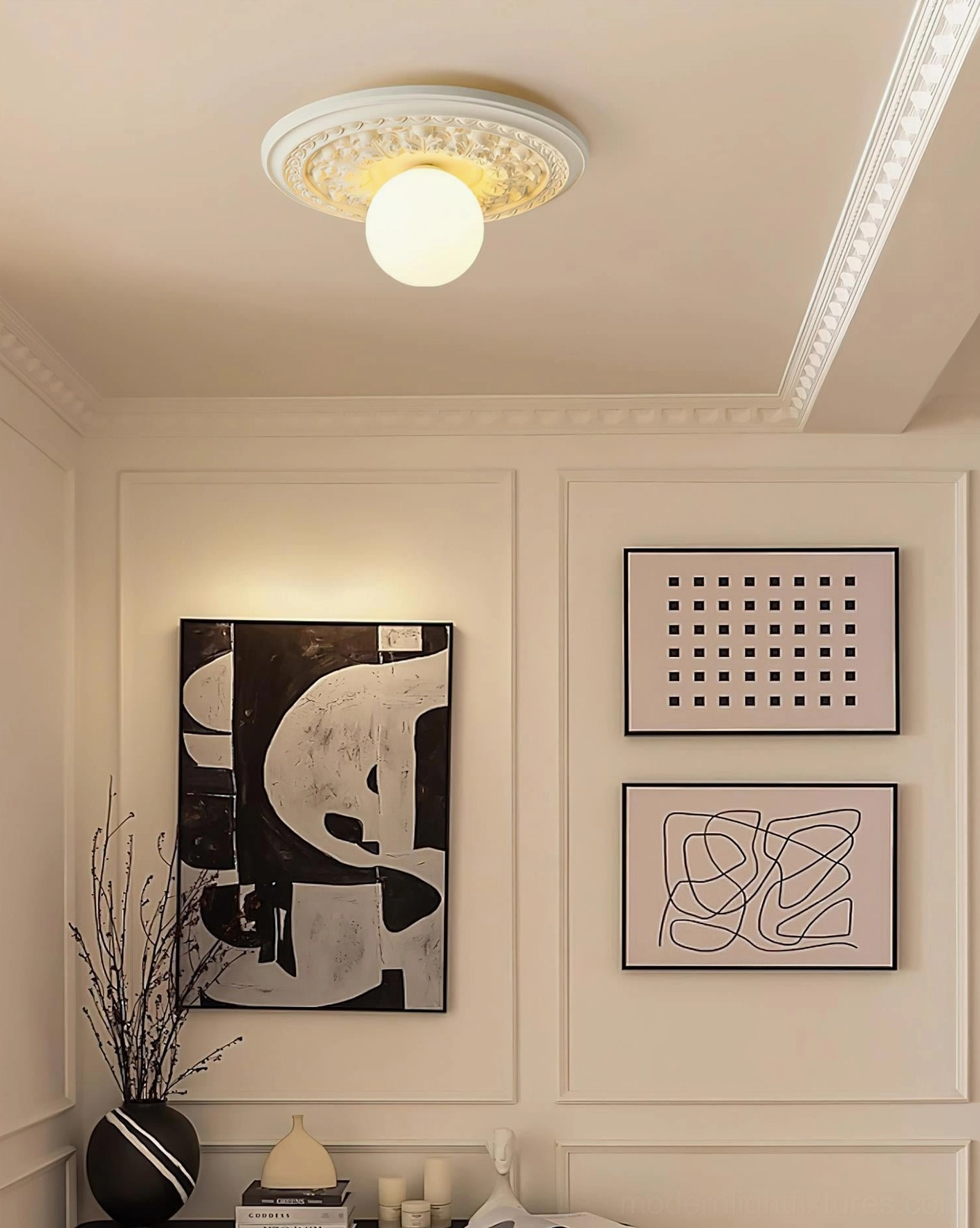 Modern ceiling light fixture installed in minimalist living room with white resin finish and soft warm light