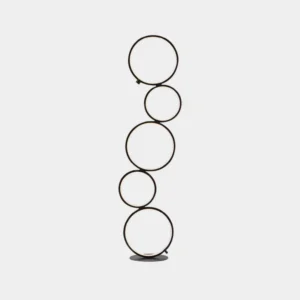 Modern minimalist ring floor lamp with matte black finish on white studio backdrop, showcasing sleek circular LED design