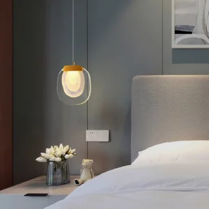 Handcrafted glass ripples pendant light installed in contemporary bedroom, warm ambient lighting