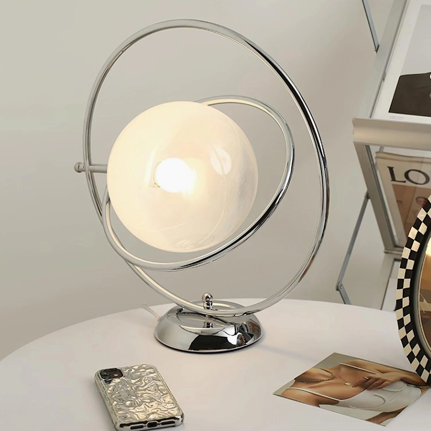 Modern rotating globe table lamp design innovation space age aesthetic