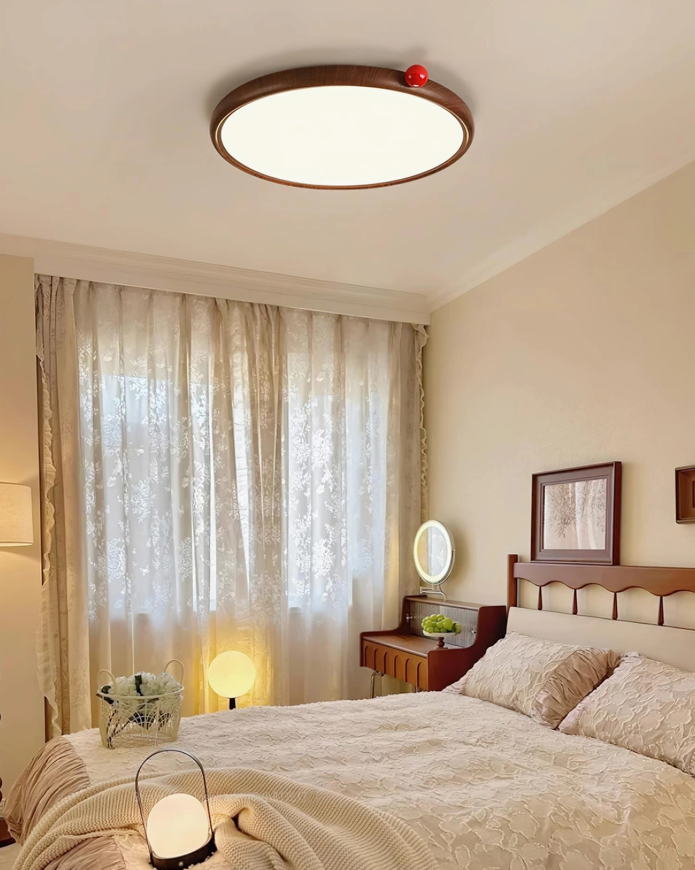 Modern round LED ceiling light fixture creating soft even illumination in contemporary interior