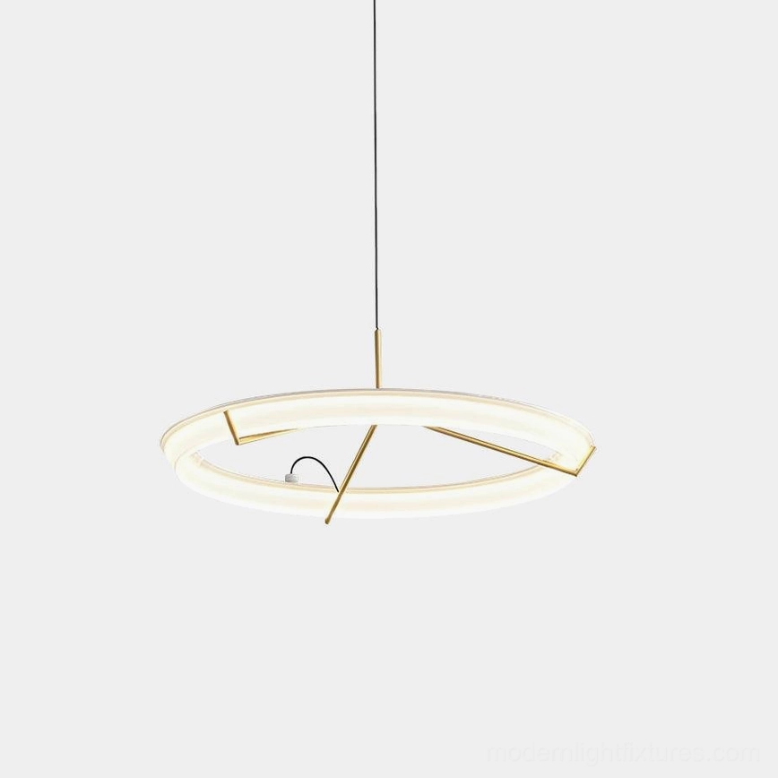 Modern round acrylic LED pendant light with brass gold frame and frosted white shade in minimalist design