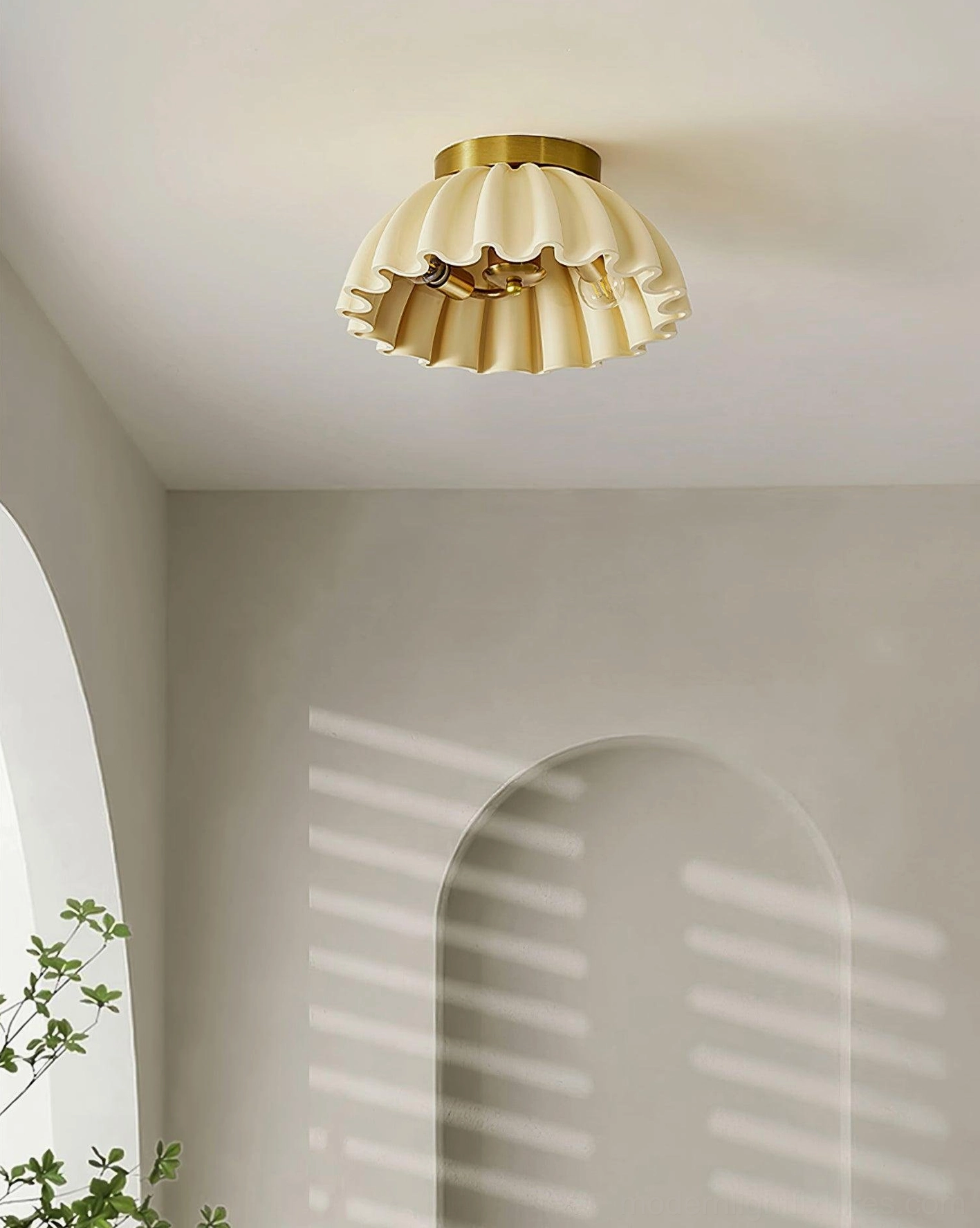 Ruffled ceiling light fixture in contemporary interior setting with modern home design