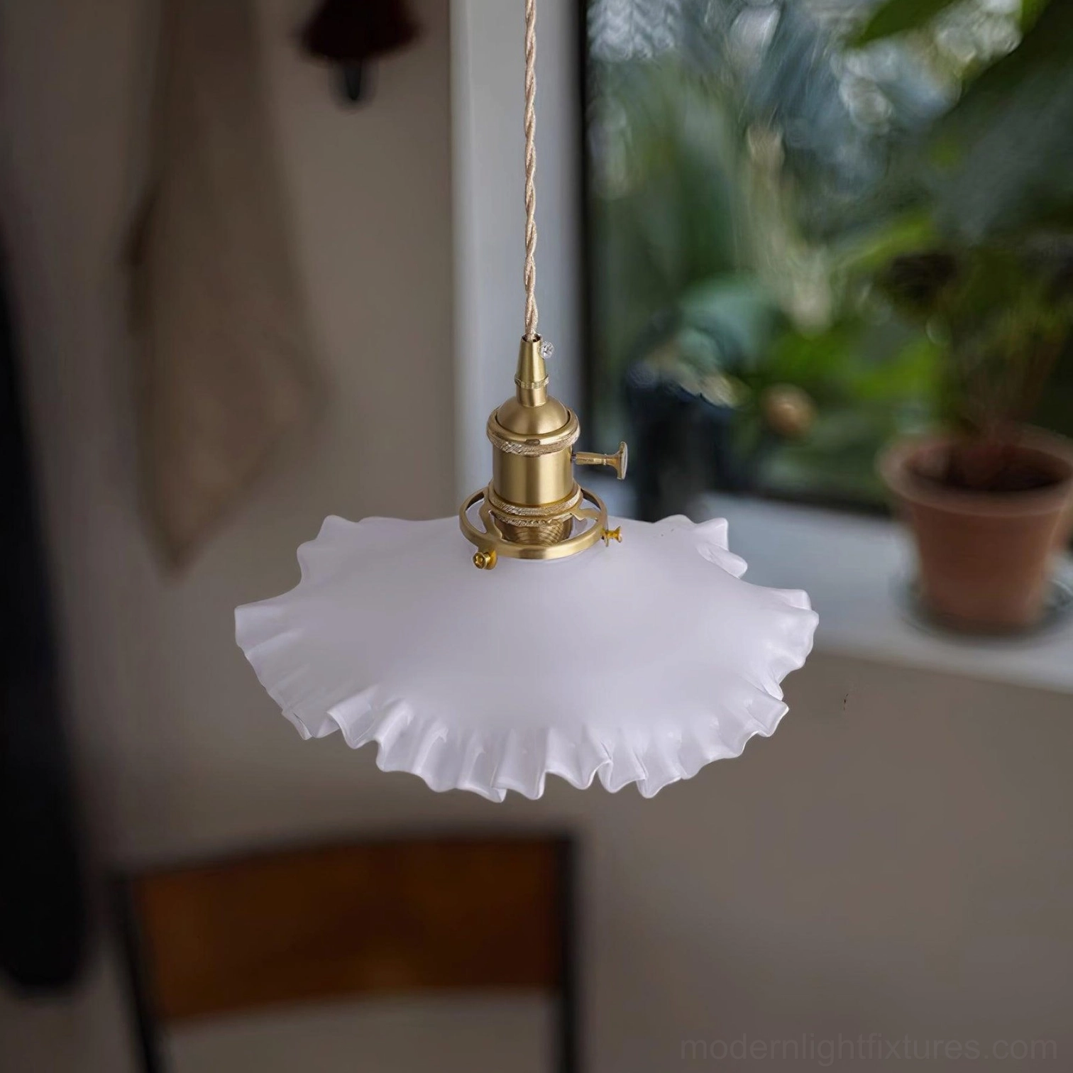 Modern ruffled glass pendant light showing fine craftsmanship and textured shade pattern detail
