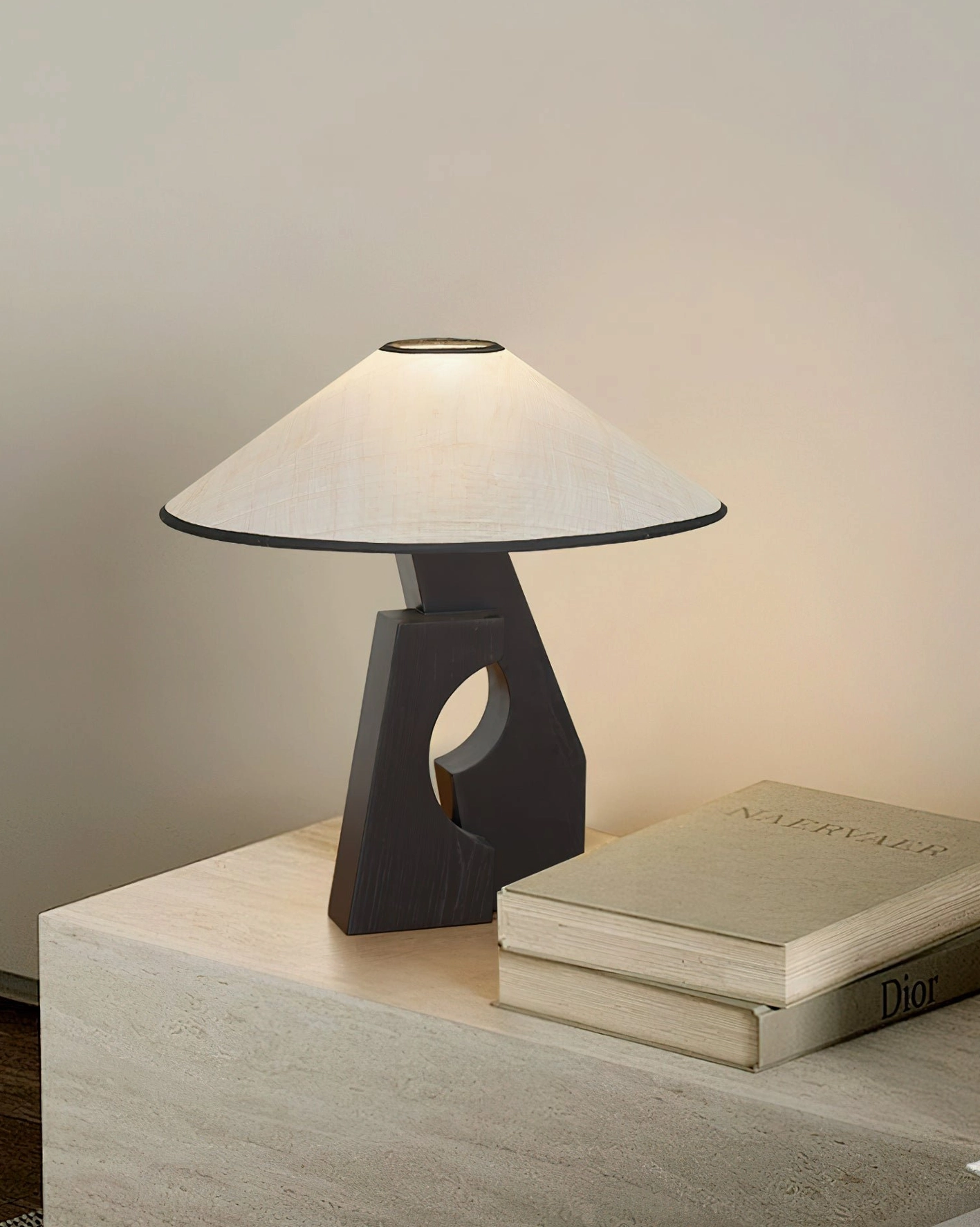 Contemporary minimalist wood table lamp on light concrete side table with modern home styling