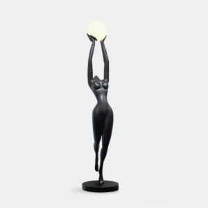 Stursa modern female sculpture floor lamp with frosted glass orb, matte black resin body, front view on white background