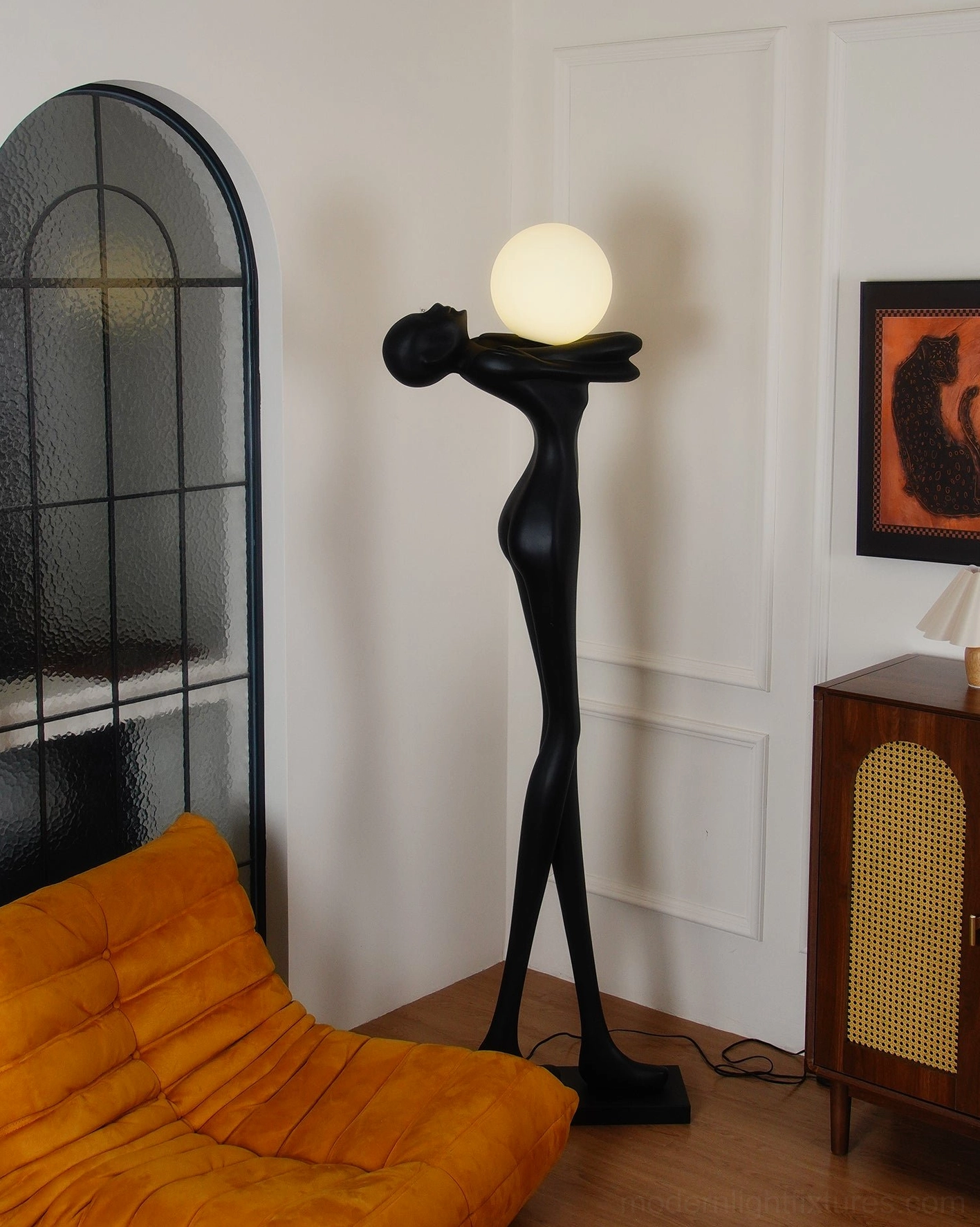 Modern sculpture floor lamp contemporary setting, artistic human silhouette, minimalist lighting design