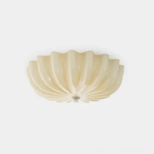 Modern jelly shell ceiling light with ribbed glass shade and spiral scalloped edges in creamy white finish, studio front view