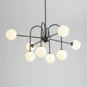 Sputnik glass ball chandelier three-quarter front view showing black metal framework with warm white frosted globe shades
