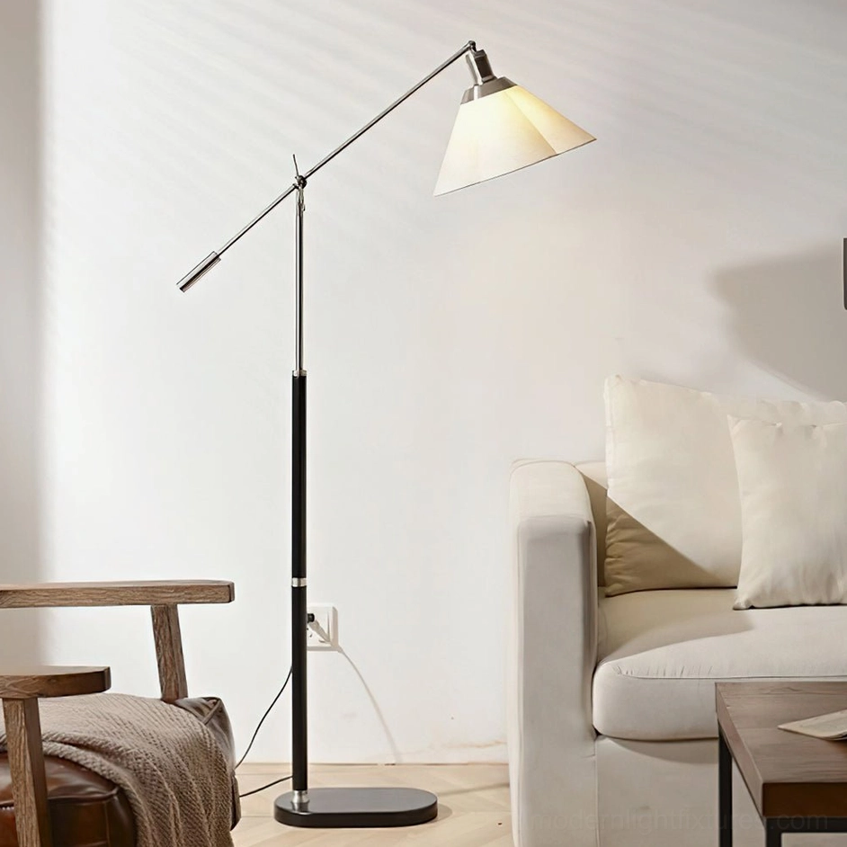 Minimalist swing arm floor lamp with matte black metal pole, round base, chrome hardware, and white pleated fabric shade