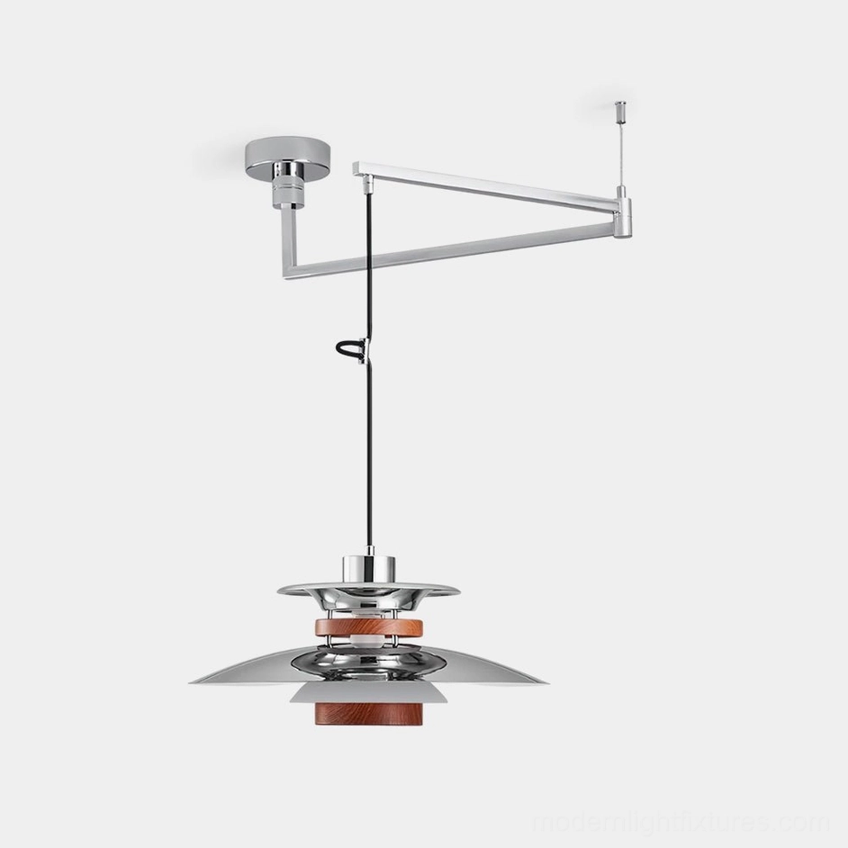 Modern swing arm pendant light with chrome finish and walnut wood shade, front studio view
