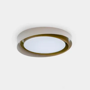 Modern swirl flush mount ceiling light with dual-tone white and gold rings, top-down studio view