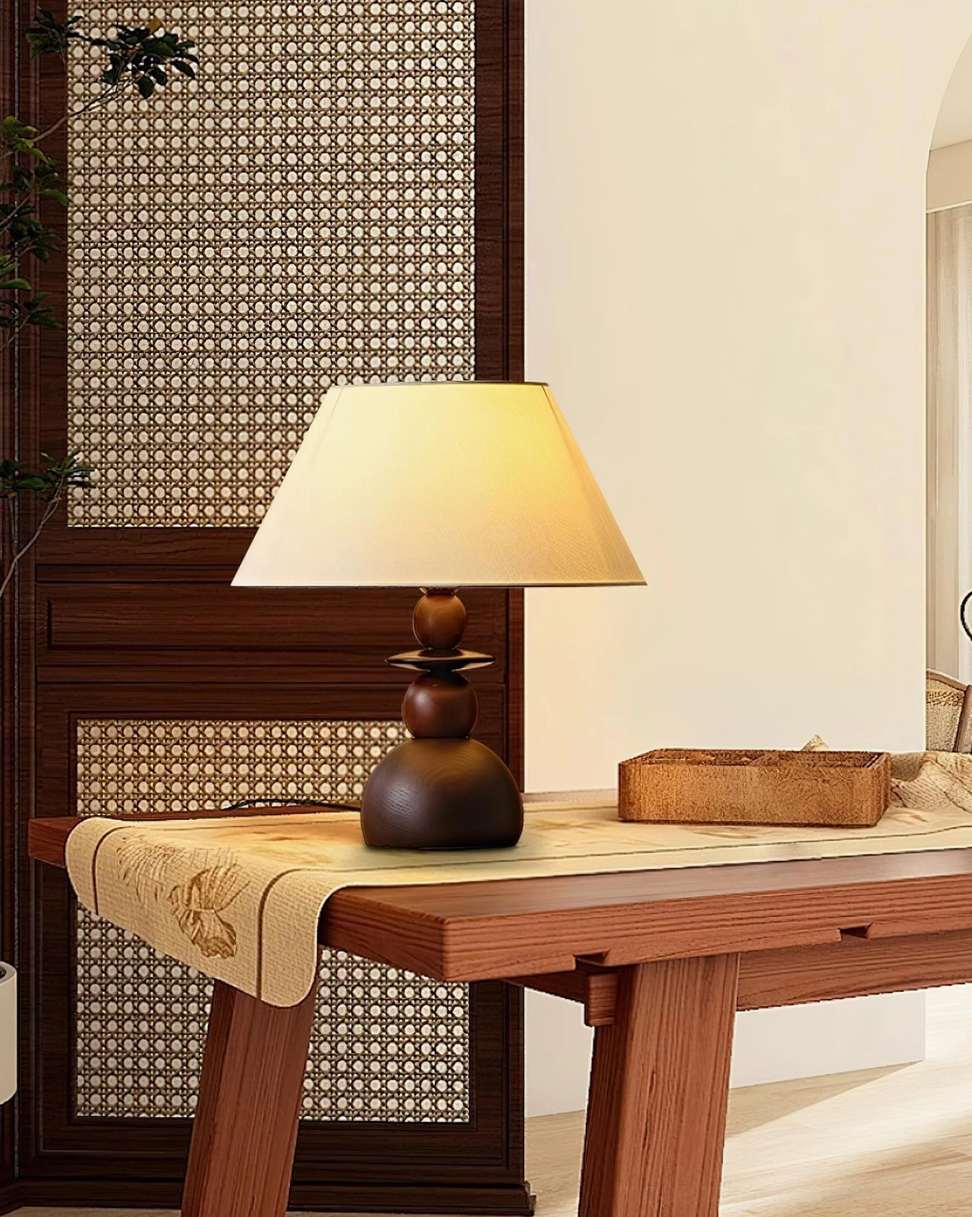 Fabric shade table lamp with stacked wooden base in neutral color palette, modern home office lighting