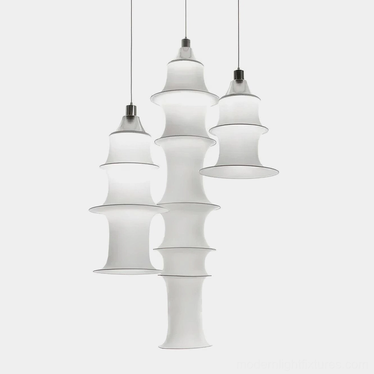 Modern tiered white fabric pendant lamp - minimalist tower design with multiple sizes displayed