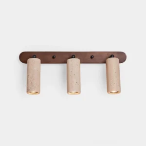 Ricerca 3-head travertine wall sconce with walnut wood backplate front view on white background showing cylindrical stone diffusers