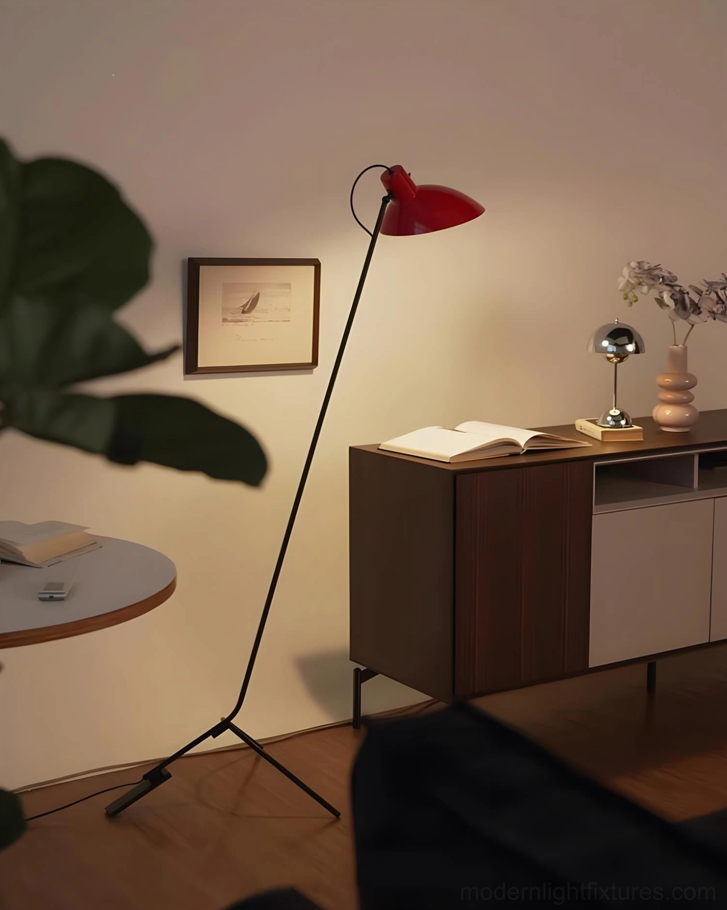 Contemporary tripod floor lamp full-length view showing proportions, curved arc metal frame, and three-prong base stability