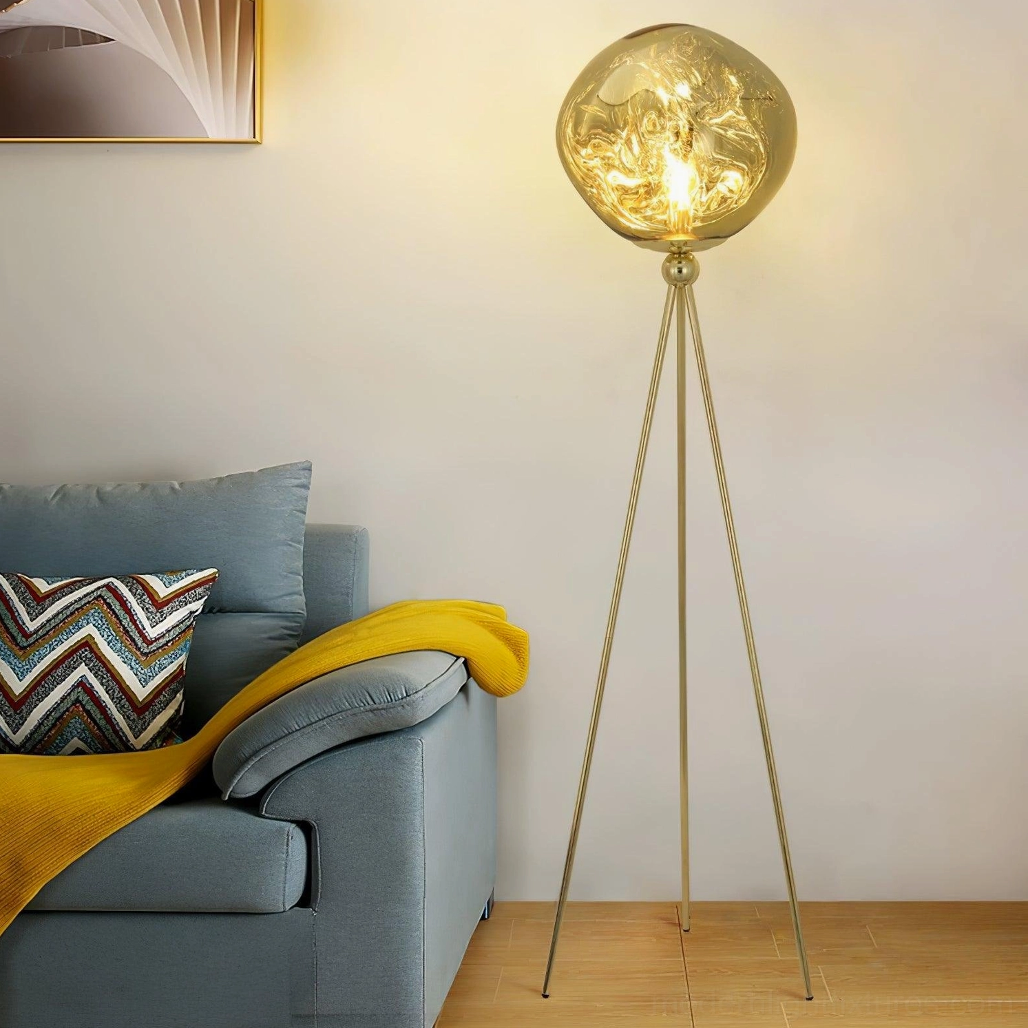 Modern 3-legged floor lamp with smoked glass lampshade emphasizing artistic lava effect and light diffusion